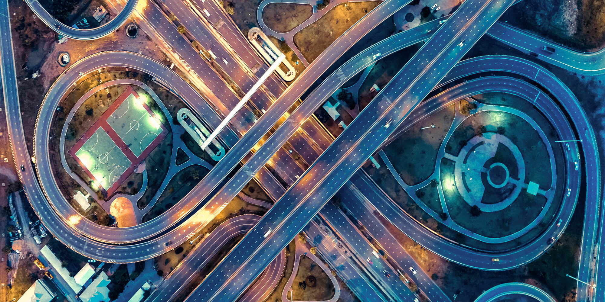 aerial top view, Expressway road intersection, traffic in bangkok at night, Chaiyaphruek road, nonthaburi,  thailand.