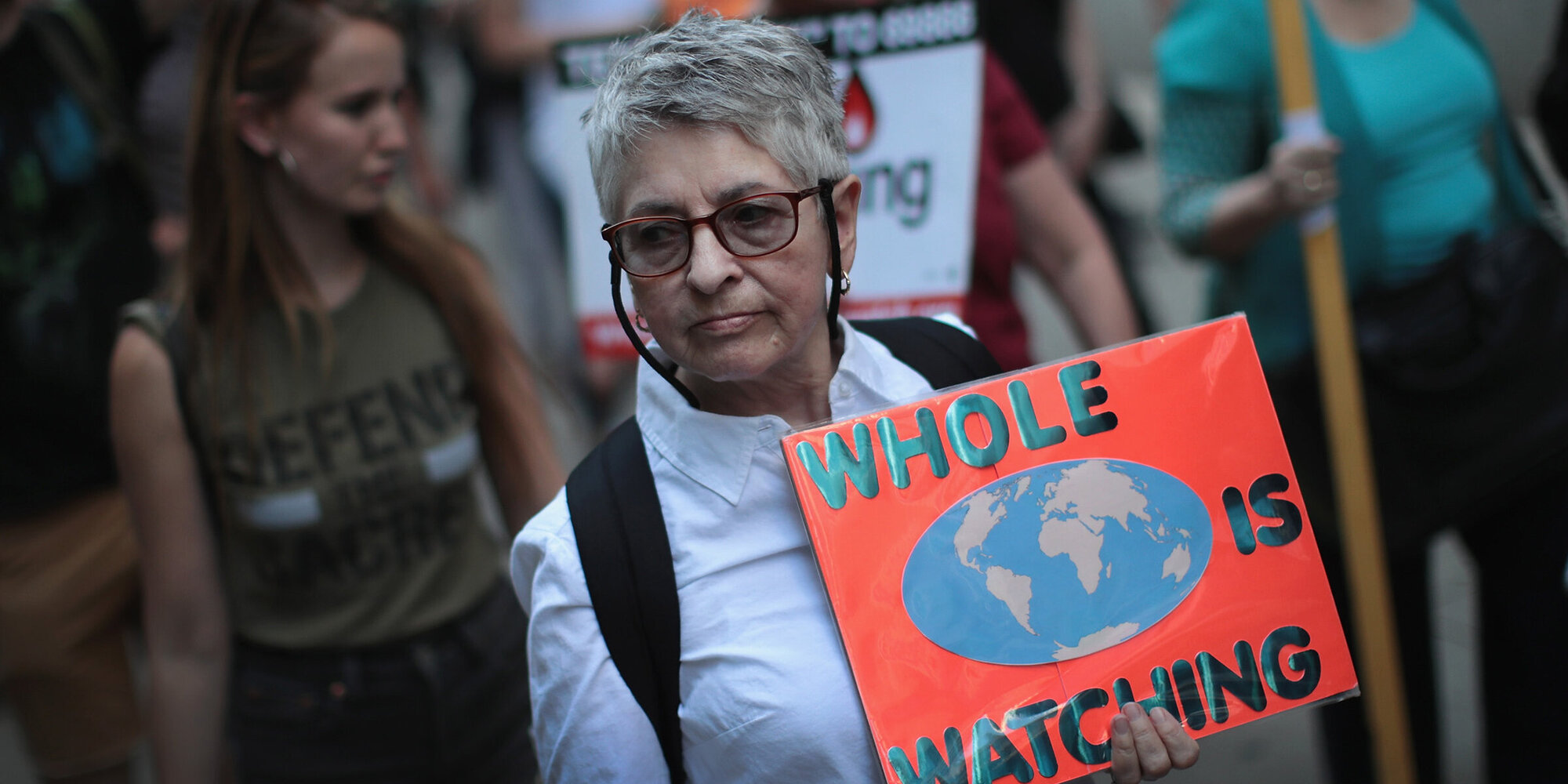 CHICAGO, IL - JUNE 02:  Demonstrators protest President Donald Trump's decision to exit the Paris climate change accord on June 2, 2017 in Chicago, Illinois.  Yesterday, in a speech from the Rose Garden, Trump announced that the United States would no longer honor the agreement, stating it imposed unfair standards on American businesses and workers.  (Photo by Scott Olson/Getty Images)