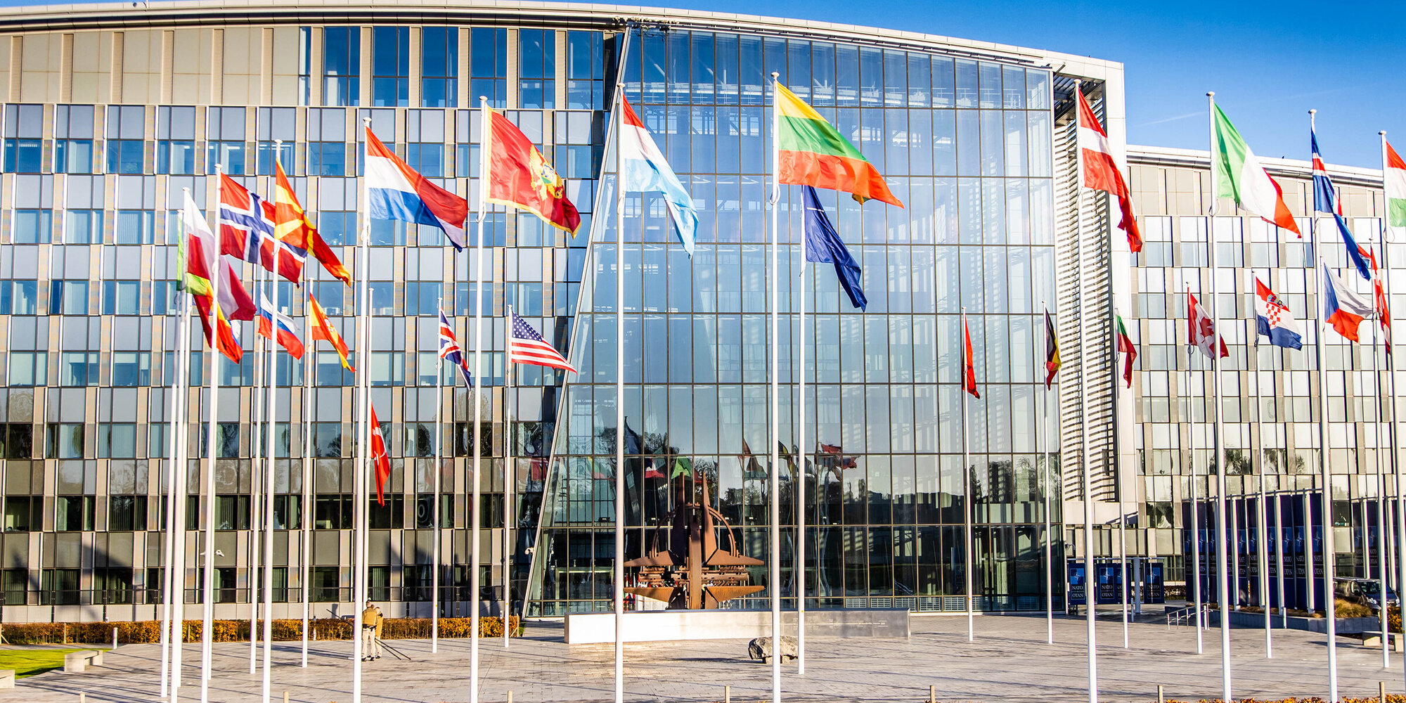 Brussels, Belgium - November 10, 2022: NATO building headquarters with flags and symbol